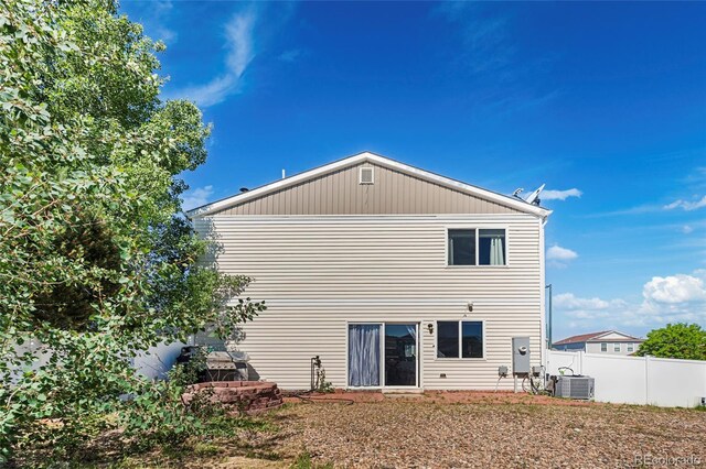 4528 Andes St, Denver, CO 80249 - rear view of property featuring central air condition unit