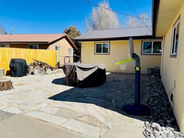 view of patio with fence