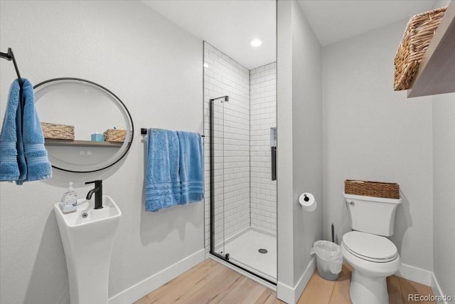 5100 Eaglewood Ln, Johnstown, CO 80534 - bathroom featuring wood finished floors and a shower stall
