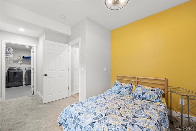 5100 Eaglewood Ln, Johnstown, CO 80534 - carpeted bedroom featuring washing machine and clothes dryer and recessed lighting