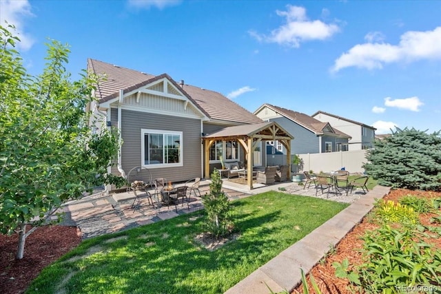 5100 Eaglewood Ln, Johnstown, CO 80534 - back of house with outdoor lounge area, a gazebo, a patio, and board and batten siding