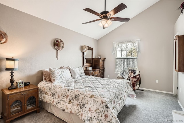 carpeted bedroom with ceiling fan, baseboards, and vaulted ceiling