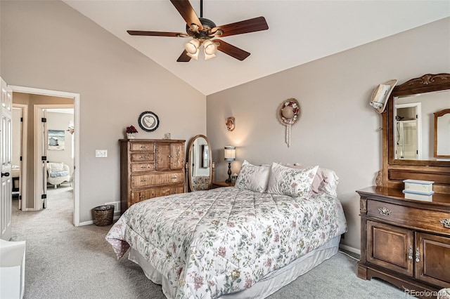 carpeted bedroom featuring baseboards, lofted ceiling, and ceiling fan