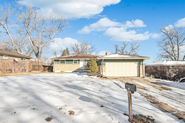 single story home featuring a garage