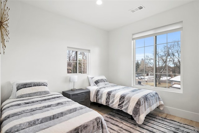 bedroom featuring dark wood-type flooring