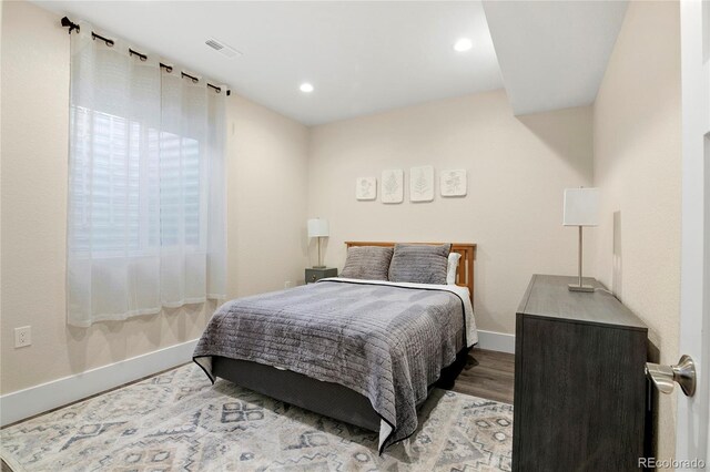 bedroom featuring light hardwood / wood-style flooring