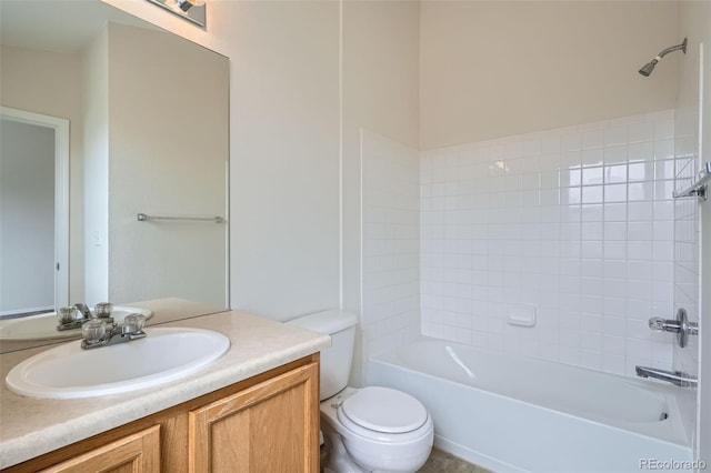 bathroom featuring toilet, vanity, and washtub / shower combination