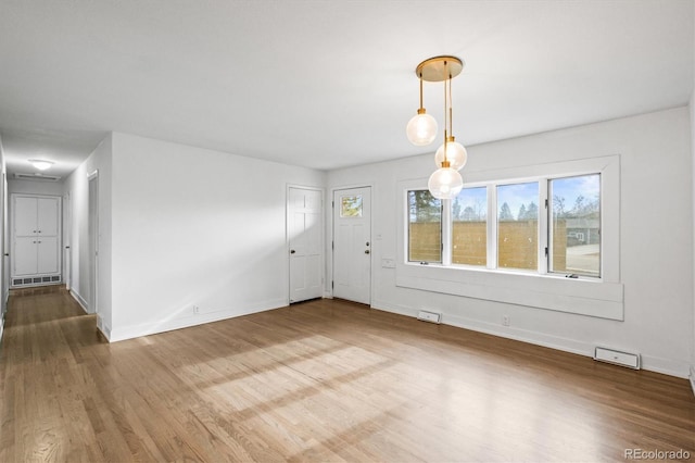 spare room featuring hardwood / wood-style flooring