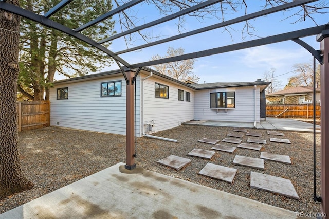 exterior space featuring a patio and a pergola