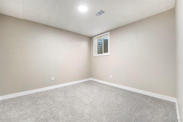 view of carpeted spare room