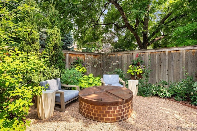 view of patio / terrace featuring fence