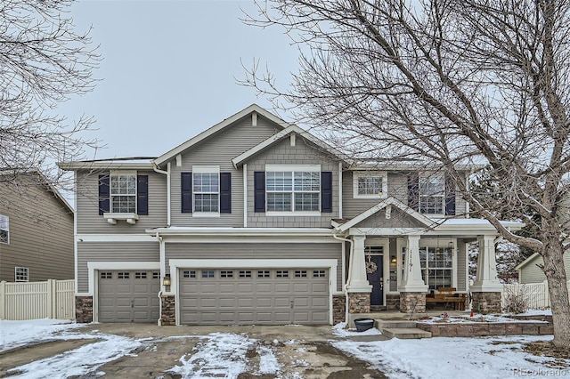 craftsman-style house featuring a garage