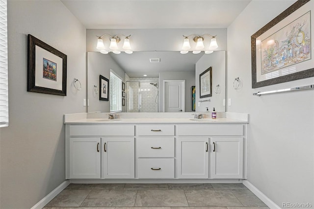 11744 Magnolia Dr, Thornton, CO 80233 - bathroom with double vanity, a stall shower, and baseboards