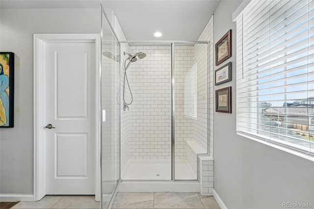 11744 Magnolia Dr, Thornton, CO 80233 - full bathroom with a stall shower, baseboards, tile patterned flooring, and recessed lighting