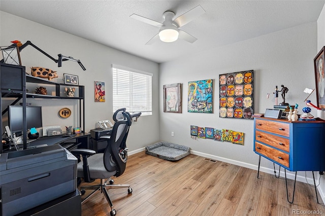 11744 Magnolia Dr, Thornton, CO 80233 - office with ceiling fan, wood finished floors, and baseboards