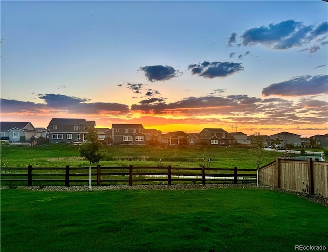 11744 Magnolia Dr, Thornton, CO 80233 - yard at dusk with a residential view
