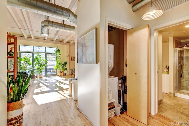 corridor featuring light hardwood / wood-style floors