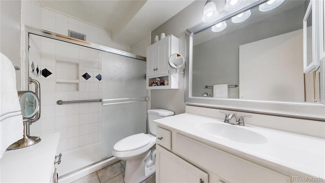13626 E Bates Ave Unit 302, Aurora, CO 80014 - bathroom with a shower stall, vanity, and tile patterned flooring