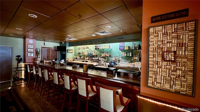 13626 E Bates Ave Unit 302, Aurora, CO 80014 - indoor wet bar featuring wood finished floors, a drop ceiling, and recessed lighting