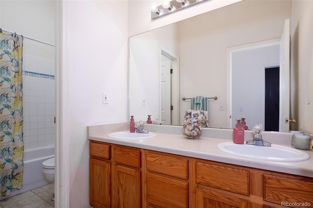 6245 Fencerail Hts, Colorado Springs, CO 80919 - full bathroom with double vanity, tile patterned floors, and shower / bath combo
