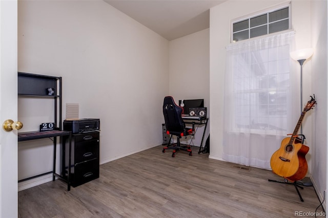 6245 Fencerail Hts, Colorado Springs, CO 80919 - office area with wood finished floors and vaulted ceiling