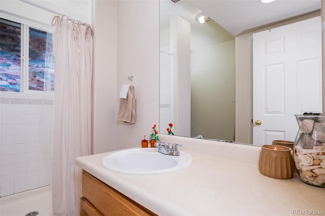 6245 Fencerail Hts, Colorado Springs, CO 80919 - full bathroom with vanity and tiled shower