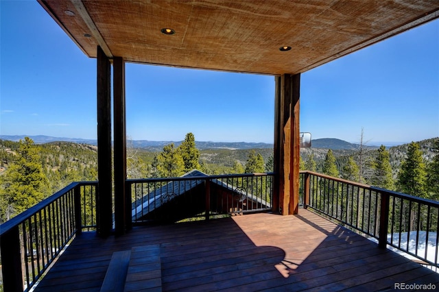 10508 Christopher Dr, Conifer, CO 80433 - deck with a mountain view and a wooded view