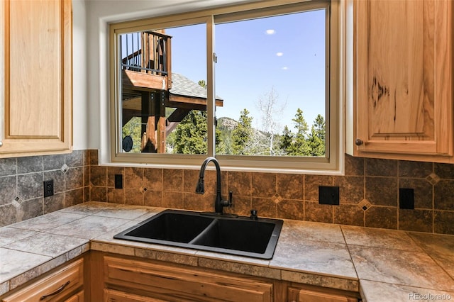 10508 Christopher Dr, Conifer, CO 80433 - kitchen featuring backsplash, tile countertops, and light brown cabinets