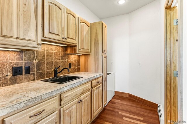 10508 Christopher Dr, Conifer, CO 80433 - kitchen featuring baseboard heating, light brown cabinets, light countertops, decorative backsplash, and recessed lighting