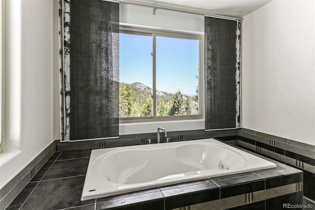 10508 Christopher Dr, Conifer, CO 80433 - bathroom with a tub with jets and plenty of natural light