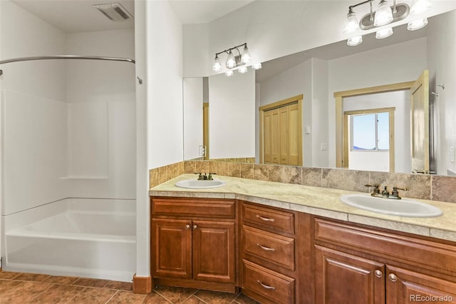 10508 Christopher Dr, Conifer, CO 80433 - full bathroom with double vanity and bathing tub / shower combination