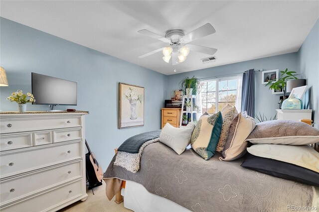 19447 E Bellisario Creek Dr, Parker, CO 80134 - bedroom with ceiling fan and light colored carpet