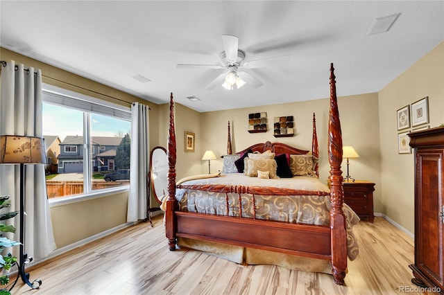 19447 E Bellisario Creek Dr, Parker, CO 80134 - bedroom featuring wood finished floors, baseboards, and a ceiling fan