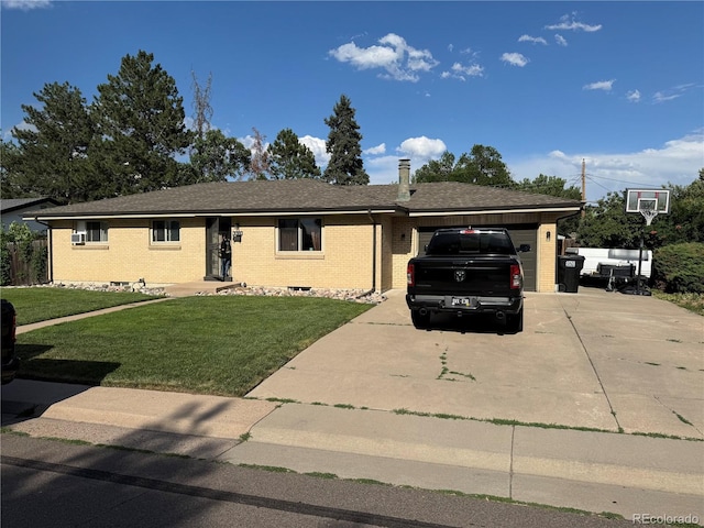 6616 S Lincoln St, Centennial, CO 80121 - ranch-style house with brick siding, concrete driveway, an attached garage, and a front yard