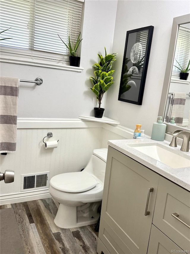 6616 S Lincoln St, Centennial, CO 80121 - bathroom featuring wood finished floors and vanity