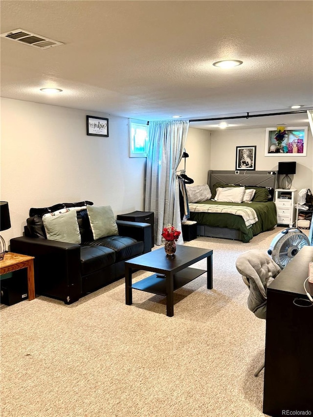 6616 S Lincoln St, Centennial, CO 80121 - carpeted living area featuring a textured ceiling