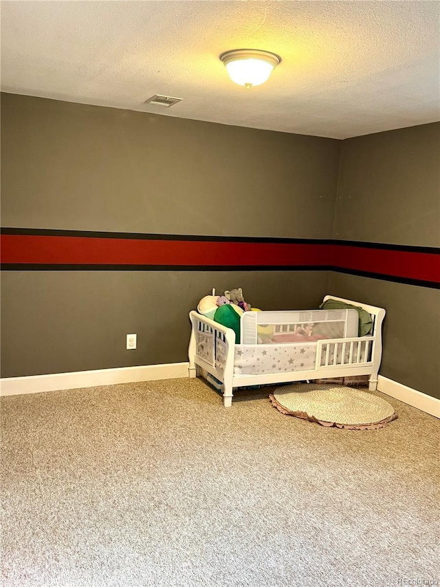 6616 S Lincoln St, Centennial, CO 80121 - bedroom with carpet floors and a textured ceiling