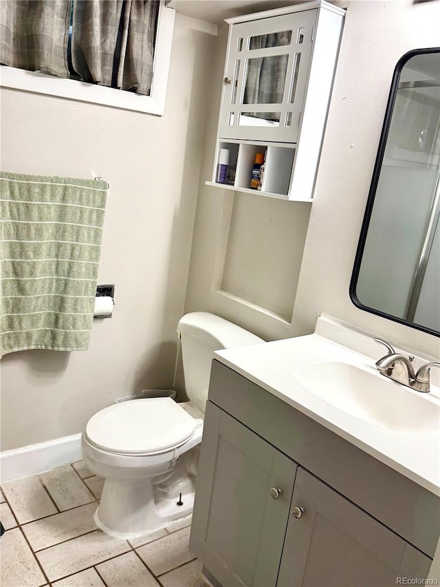 6616 S Lincoln St, Centennial, CO 80121 - bathroom with vanity and toilet