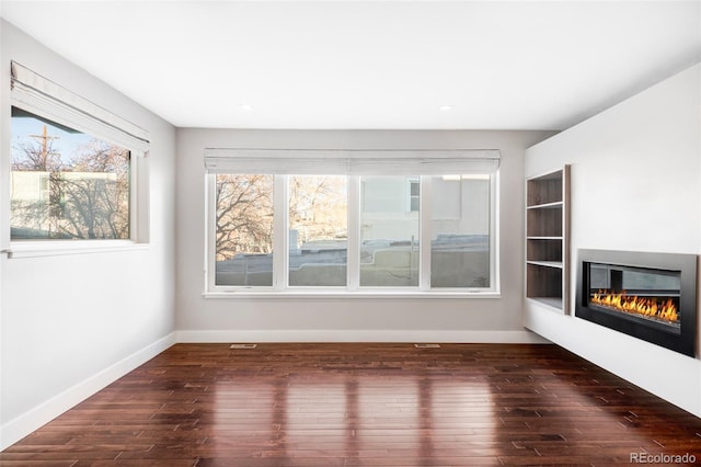 interior space with dark hardwood / wood-style floors