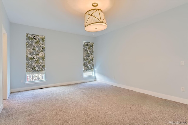 spare room with carpet flooring