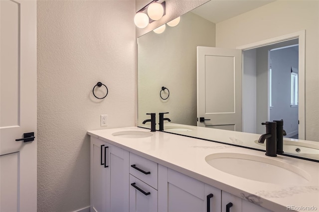 bathroom featuring vanity