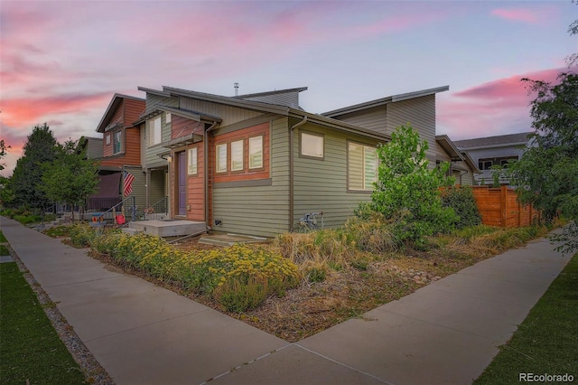 10095 E 59th Ave, Denver, CO 80238 - view of property exterior at dusk