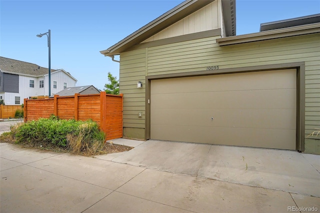 10095 E 59th Ave, Denver, CO 80238 - garage featuring concrete driveway