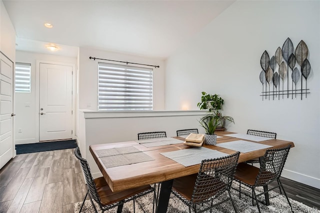 10095 E 59th Ave, Denver, CO 80238 - dining area featuring wood finished floors and recessed lighting