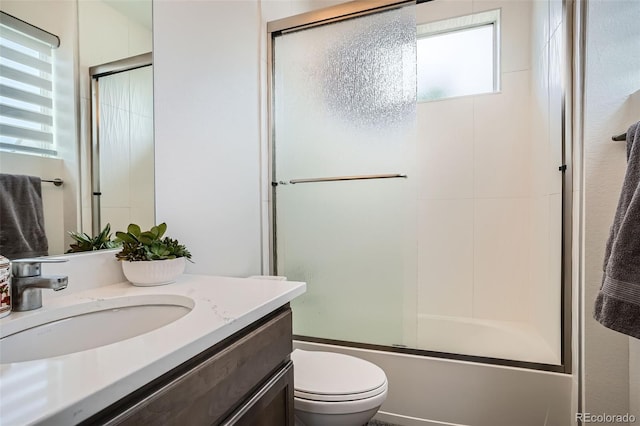 10095 E 59th Ave, Denver, CO 80238 - full bathroom featuring vanity and shower / bath combination with glass door