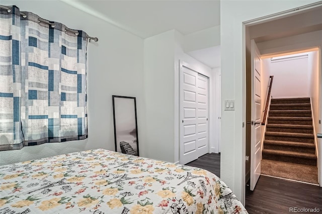10095 E 59th Ave, Denver, CO 80238 - bedroom with dark wood finished floors and a closet