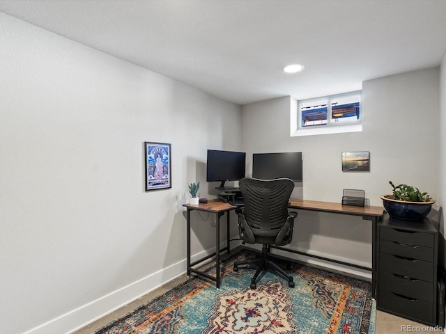 office space with baseboards, recessed lighting, and carpet floors