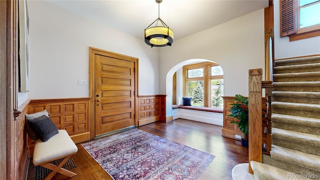 foyer entrance featuring dark hardwood / wood-style flooring