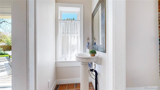 bathroom featuring tile floors