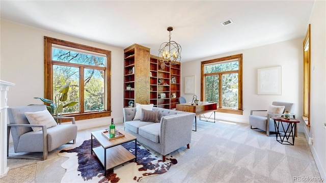 living room featuring carpet floors and a chandelier